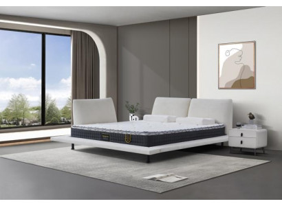 Nowoczesne łóżko boxspring Comfort Design z białym minimalistycznym wezgłowiem