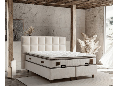 Eleganckie łóżko z materacem w beżowym materiale