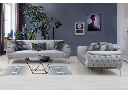 Szara sofa do salonu materiałowa nowoczesny design Chesterfield Włókienniczy