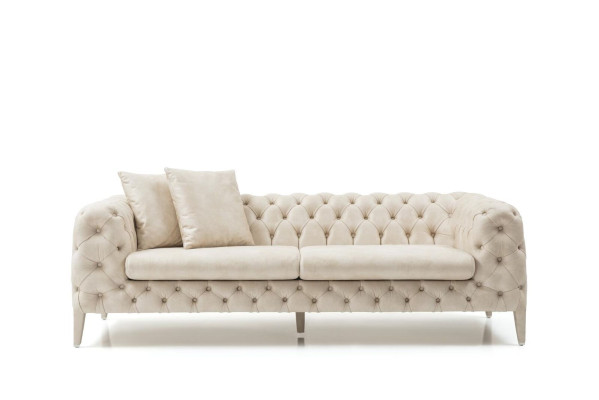 Pokój dzienny biała czteroosobowa designerska luksusowa sofa 4-miejsce siedzące tapicerowana kanapa