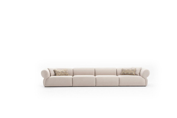 Duża, beżowa, atrakcyjna sofa z 6 sypialniami, o prostym designie i wykonana z najwyższej jakości materiałów
