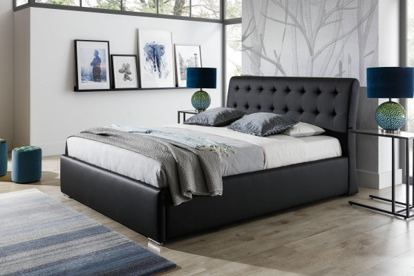 Luksusowe łóżko sypialniane wyściełane w stylu Chesterfield do luksusowego hotelowego pokoju dwuosobowego.