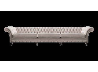 Nowoczesna sofa Chesterfield z trzema miejscami siedzącymi, idealna do salonu.