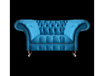 Niebieski dwuosobowy kanapa o designie Chesterfield z tkaniny.