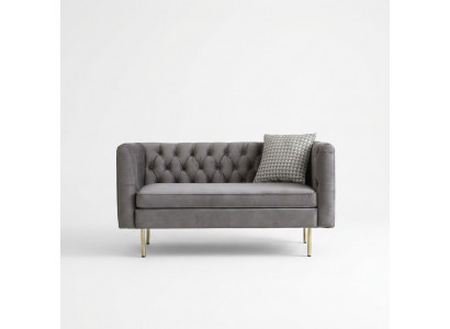 Mebel w stylu angielskim Chesterfield dwuosobowa sofa różowo-turkusowo-żółto-niebieska.