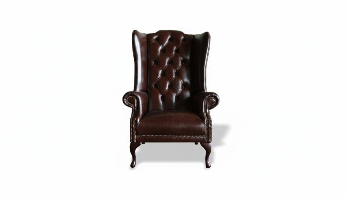 Chesterfield fotel z podłokietnikami, kanapy z tapicerowanymi poduszkami, styl antyczny, fotel krzesło, meble klasyczne.