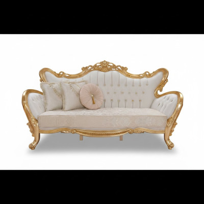 luksusowa sofa relaksacyjna w klasycznym stylu ze złotymi wzorami