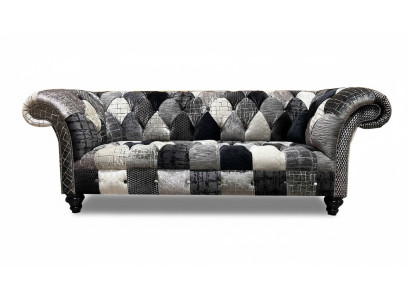 Luksusowa aksamitna sofa z wzorem Chesterfield i kolorową kratką