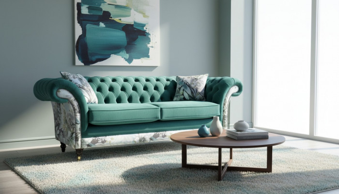 żywa trzyosobowa sofa z Chesterfield w delikatnym szmaragdowym kolorze z kwiatowym wzorem