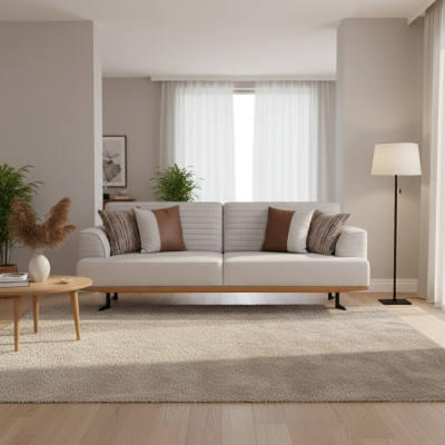 Współczesna luksusowa sofa z szarym tapicerowaniem do salonu.