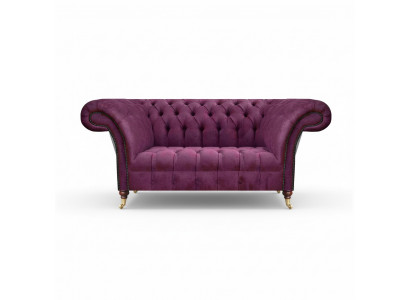 fioletowa sofa dwuosobowa kanapa wnętrze salon meble tapicerowane Chesterfield