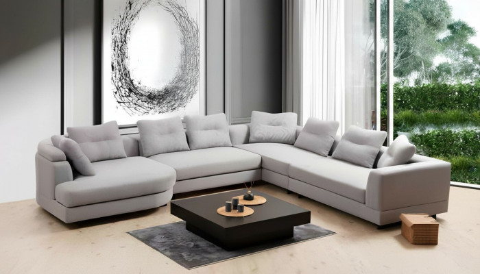 Sofa narożne do salonu w kształcie litery L, nowoczesny design, materiał tekstylny, kolor biały.