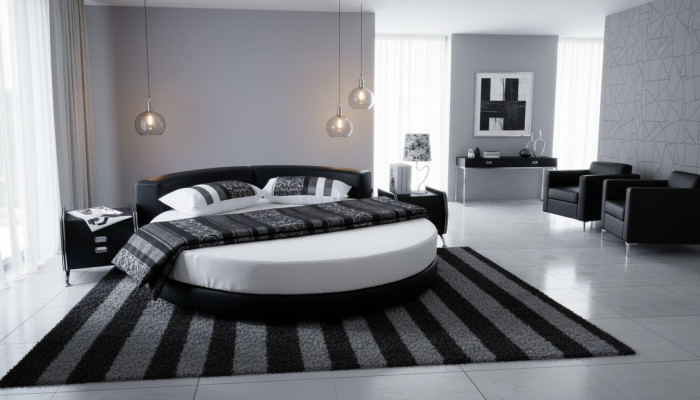 Czarna okrągła łóżko z nowoczesnym designem, eleganckimi detalami i sofą
