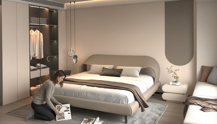 Eleganckie szare łóżko z minimalistycznym, zaokrąglonym designem