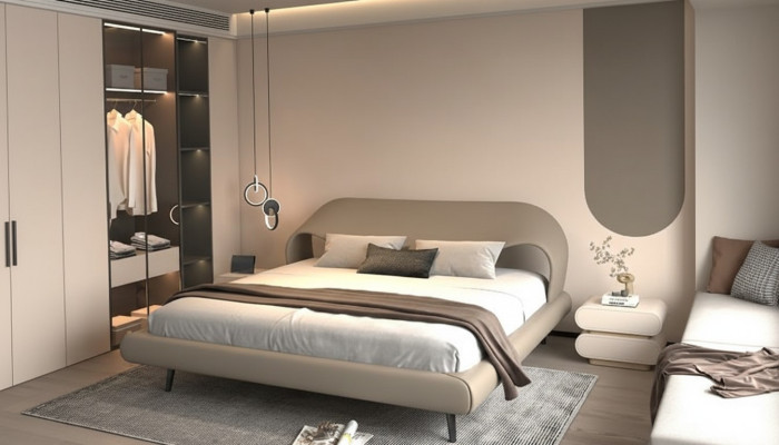 Eleganckie szare łóżko z minimalistycznym, zaokrąglonym designem