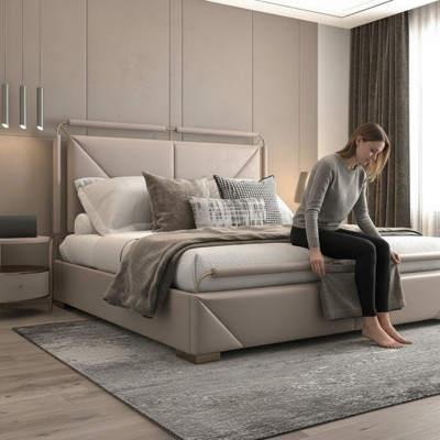 Luksusowe łóżko w nowoczesnym designie beżowe z złotymi akcentami i eleganckim wezgłowiem